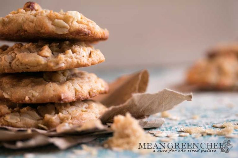 Stacked Peanut Butter Oatmeal Cookies pictured with brown sugar.