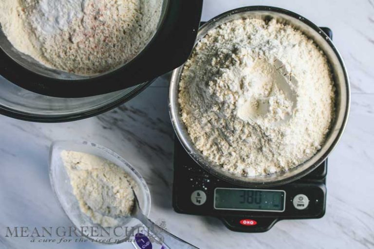 Flour being measured on a scale for Bakery Style Chocolate Chip Cookies.