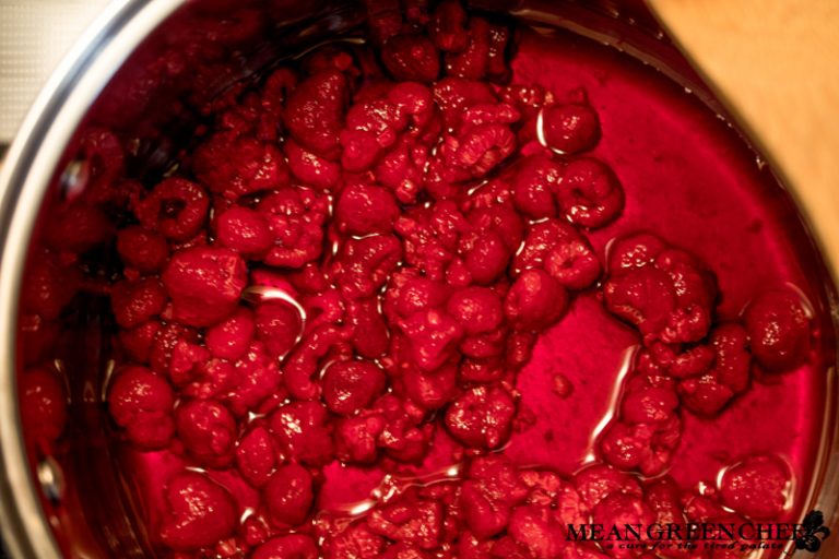 Raspberries cooking down for Pink Champagne Raspberry Cupcakes
