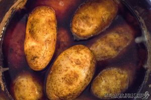 Potatoes cooked in stout broth from corned beef for Colcannon in the Instant Pot.