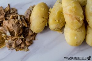 Boiled, peeled potatoes for Traditional Irish Colcannon.