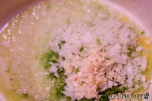 Diced onions, green peppers and garlic being cooked for American Chop Suey.