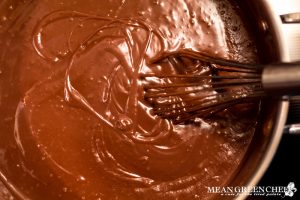 Rich Chocolate Creme Patissiere Pastry Cream being made on the stove top.