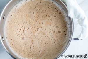 Heavy cream and chocolate being cooked for Rich Chocolate Creme Patissiere Pastry Cream.