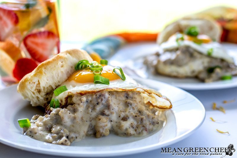 Country Sausage Gravy, served over fluffy buttermilk biscuits and topped with a bright sunny side up egg.