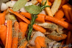 Vegetables + herbs in the Instant Pot for Red Wine Pot Roast.