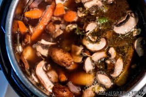 Red Wine Pot roast cooking in the Instant Pot.