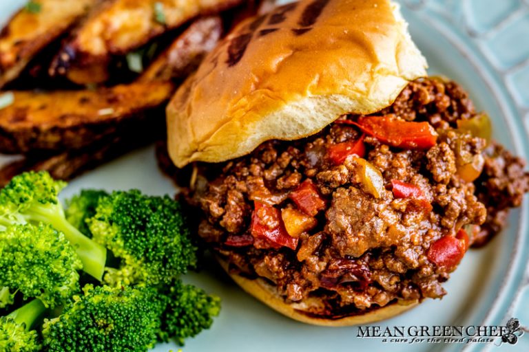 Extra Sloppy Joes on a bun with broccoli and fries.