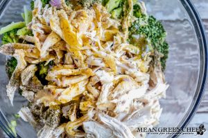 Italian chicken pasta salad being made.