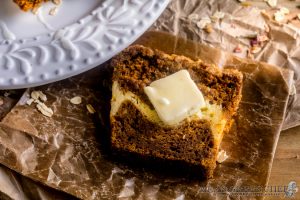 layered Pumpkin bread on rustic background.