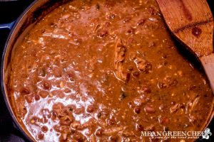 Roasted Pumpkin Chicken Chili in a Dutch Oven cooking