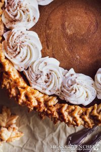 Punch of Pumpkin Pie baked and garnished with fresh whip cream.