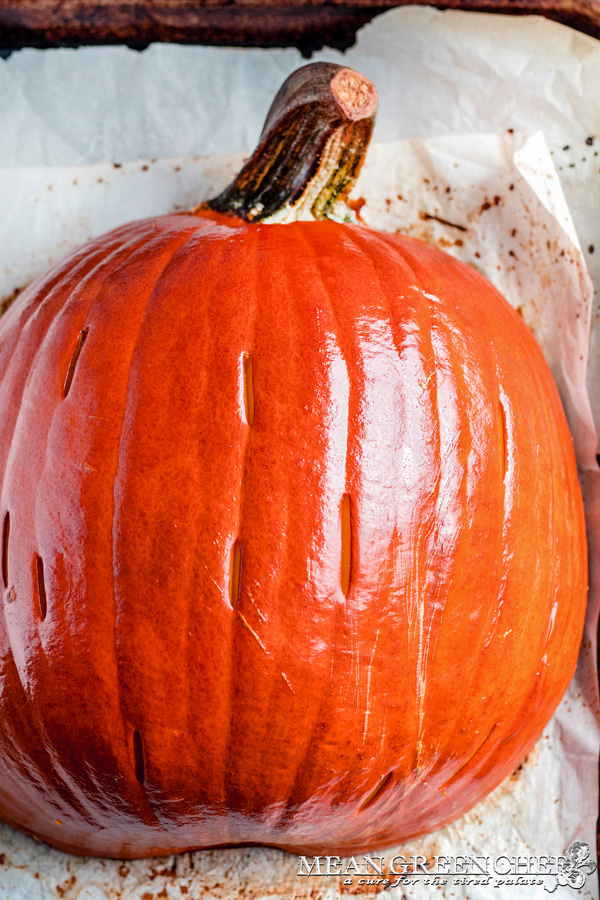 Roasted Sugar Pumpkin on a parchment lined baking sheet.