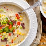 Sweet Corn Chowder in a classic white bowl on a wooden background