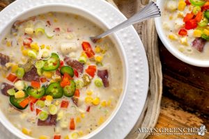 Sweet Corn Chowder in a classic white bowl on a wooden background