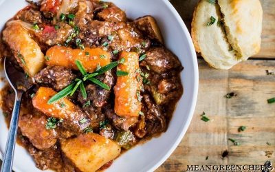 Bowl of Old Fashioned Beef Stew with biscuits.