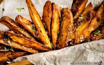 Crispy Oven Baked Fries sprinkled with fresh chopped Rosemary and Kosher sea salt.